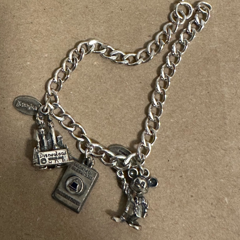 Vintage sterling silver bracelet with silver Disneyland charms